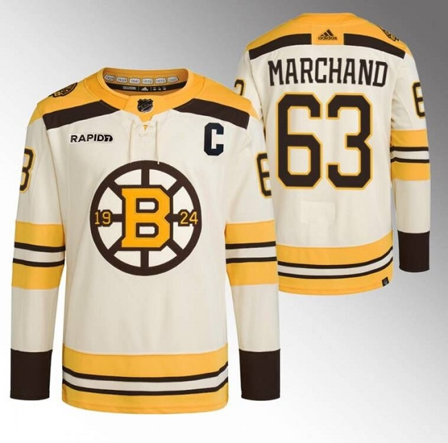 Boston Bruins #63 Brad Marchand Cream With Rapid7 Patch 100th Anniversary Stitched Jersey
